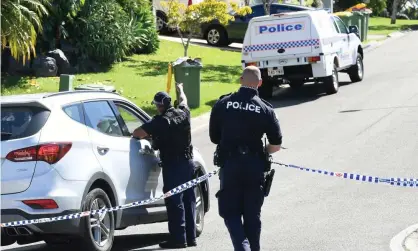  ?? Photograph: Dave Hunt/AAP ?? Queensland police were called to a home in Arundel on the Gold Coast where officers found a woman’s body.