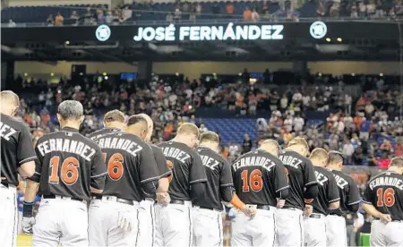  ?? CARLINE JEAN/STAFF FILE PHOTO ?? Marlins players wore copies of Fernandez’s uniform jersey to honor their teammate. His belongings remain in the clubhouse, the way he left them.