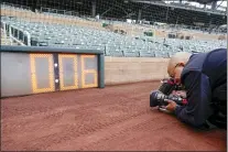  ?? MORRY GASH — THE ASSOCIATED PRESS ?? A new pitch clock at Salt River Field in Scottsdale, Ariz, is among the changes to MLB rules going into effect this spring.