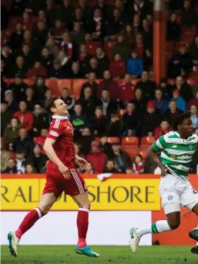  ??  ?? Dedryck Boyata scores against Aberdeen in Friday’s dress rehearsal for the Scottish Cup final. Celtic won 3-1