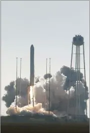  ?? STEVE HELBER — THE ASSOCIATED PRESS ?? Northrop Grumman’s Antares rocket lifts off the launch pad at NASA Wallops Flight facility in Virginia on Saturday.