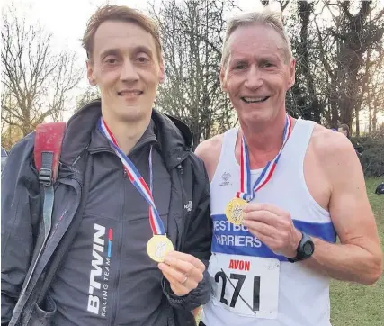  ??  ?? Oliver Beale, left, with Westbury Harriers club-mate Mike Mewse