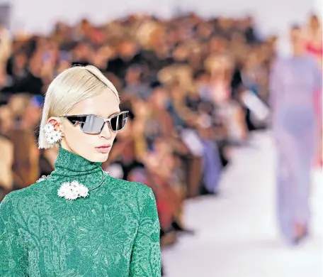  ?? ?? Well framed A model wears sharp spectacles at the Givenchy Autumn/winter 2023-24 show during Paris Fashion Week.