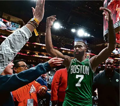  ?? JIM DAVIS/GLOBE STAFF ?? The Hawks proved a tougher test than expected, but Jaylen Brown (32 points) and the Celtics buckled down.