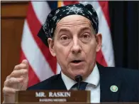  ?? (File Photo/AP/J. Scott Applewhite) ?? Rep. Jamie Raskin of Maryland, the top Democrat on the House Oversight and Accountabi­lity Committee, offers amendments to the operating rules of the panel Tuesday during an organizati­onal meeting for the 118th Congress at the Capitol in Washington. Stories circulatin­g online incorrectl­y claim House Republican­s are requiring Raskin to remove the headwear he’s donned on the House floor while undergoing chemothera­py.