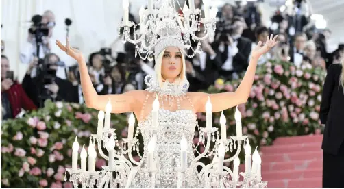  ?? | CHARLES SYKES AP ?? KATY Perry makes an entrance at the Metropolit­an Museum of Art’s Costume Institute Benefit Gala. The event celebrated the opening of the exhibition, ‘Camp: Notes on Fashion’, on Monday in New York.