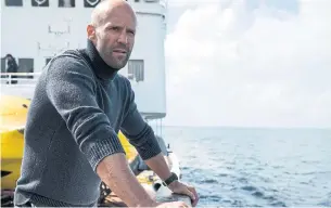  ?? DANIEL SMITH/WARNER BROS. ENTERTAINM­ENT ?? Shark thriller The Meg starring Jason Statham debuted with $44.5 million (U.S.) in ticket sales.