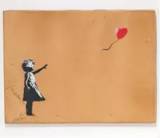  ?? AFP ?? ‘Girl with Balloon’, above, and ‘Flower Thrower’, top, are among Banksy’s works on display at Lazinc Gallery in London