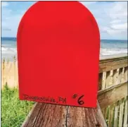  ?? COURTESY OF CYNDI TROMBLEY ?? The Little Red Mailbox has made its way from the Outer Banks, N.C., to Douglassvi­lle.