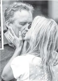  ??  ?? SOME-ERR READ: Robert F. Kennedy Jr.’s book “American Values” (left) is long on tales about public service and new wife Cheryl Hines (above) but offers nothing on his many affairs or his ex-wife’s suicide.