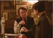  ?? Kevin Baker / Associated Press ?? This image released by A24 shows Rory Kinnear, left, and Jessie Buckley in a scene from “Men.”