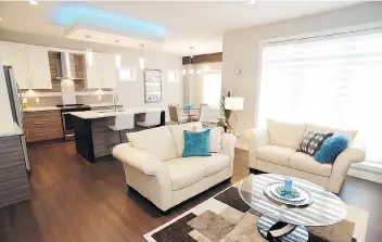  ?? BOYCHUK CONSTRUCTI­ON) ?? At 1,891 square feet, the Boychuk show home at 335 Flynn Manor is ideal for the growing family or a couple who loves to entertain. The open concept great room overlooks the linear park which extends along the back of the lot. Garden doors in the dining...