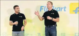  ?? AFP ?? Walmart CEO Doug McMillon (right) with Flipkart cofounder and CEO Binny Bansal in Bengaluru