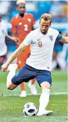  ??  ?? Spot on: Harry Kane scores a penalty in the group game against Panama