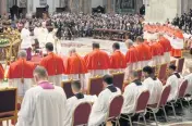  ?? ANDREW MEDICHINI AP ?? Pope Francis prays in front of the 20 new cardinals during consistory inside St. Peter’s Basilica, at the Vatican, on Saturday.