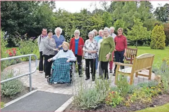  ?? 01_B37glen02 ?? Attending guests, residents and visitors at the official opening of the sensory garden.