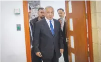  ?? (Yonatan Sindel/Flash90) ?? OPPOSITION LEADER Benjamin Netanyahu arrives for a hearing at the Jerusalem District Court last week.