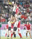  ??  ?? Fiji’s Leone Nakarawa is held aloft by team-mates as he wins a lineout during the Rugby World Cup Pool D game at Oita Stadium between Wales and Fiji in Oita, Japan on Oct
9.
