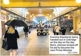  ?? GED CANN ?? Evening Standards being handed out in Uxbridge on the day on the day Boris Johnson kicked off his bid to become the next Prime Minister