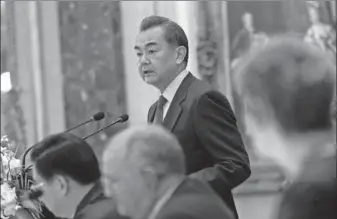  ?? ZHANG WEI / CHINA DAILY ?? Foreign Minister Wang Yi speaks at an anti-terrorism symposium on Friday in Beijing. It was organized as part of the Global Counterter­rorism Forum.