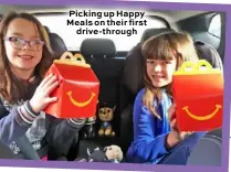  ??  ?? Picking up Happy Meals on their first drive-through