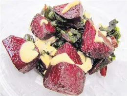  ??  ?? This warm Beet Salad With Creamy Red Chile Dressing makes use of both the beet bulb and the greens, which will be extra fresh when purchased from a local farmer.