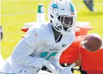  ?? CHARLES TRAINOR JR./MIAMI HERALD ?? Dolphins wide receiver Preston Williams runs a drill during training camp on Aug. 17. He dominated the first week of padded practice.