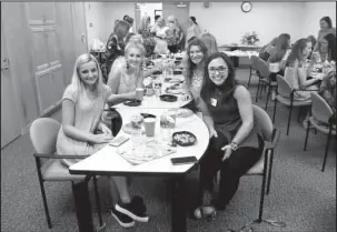  ?? Submitted photo ?? BEADING FOR A CAUSE: Hot Springs Debutantes Abby Simmons, left, Megan Morris, Mary Catherine Hancock and Caroline Zeiser crafted bracelets for cancer patients at the “Beading for a Cause” party.