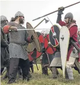 ??  ?? BATTLE re-enactors flocked to the site of the Battle of Hastings yesterday to recreate the clash that changed British history forever.
It was part of a weekend of celebratio­ns to mark its 950th anniversar­y.
Confusingl­y, the Battle of Hastings didn’t...