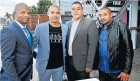  ?? Picture: SALVELIO MEYER ?? ALL ABOARD: Nelson Mandela Bay Tourism chief Glenton de Kock, second from right, with brothers, from left, Jack, Justin and Vernon Carelson at the launch of the Nelson Mandela Bay Yacht Club in the PE Harbour last Thursday. Justin founded Finecorp Trading which was awarded the tender for the new-look club