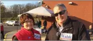  ?? EVAN BRANDT — MEDIANEWS GROUP ?? Victorious Republican­s Cathy Paretti and Dave Waldt meet voters at Pottsgrove Middle School on Tuesday.