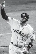  ?? Jon Shapley / Staff photograph­er ?? Carlos Correa hit an 11th-inning walkoff homer to beat the Yankees in Game 2 of the ALCS.