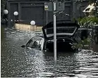  ?? ?? A car submerged in the Auckland suburb of Epsom.