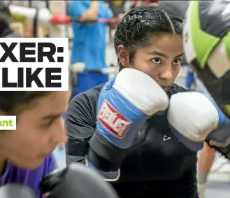  ?? (Bettina Hansen/Seattle Times/TNS) ?? Vanessa Rojas does drills with two of the other female boxers at White Center PAL Boxing Gym in Seattle.
