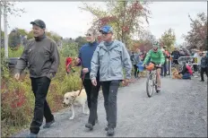  ?? KIRK STARRATT ?? It was a celebratio­n of active transporta­tion as people attending the official opening of the New Minas to Grand Pré section of the Harvest Moon Trailway took part in a group jog, bike or walk.