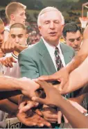  ?? FILE PHOTO ?? Lou Henson stands 16th on the all-time list for most coaching victories in Division I NCAA men’s basketball history.