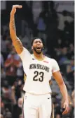  ?? Gerald Herbert / Associated Press ?? New Orleans forward Anthony Davis reacts after a dunk in the second half.