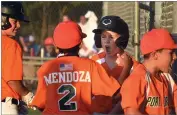  ?? RECORDER PHOTO BY CHIEKO HARA ?? Lewis Green, second from right, celebrates scoring a run Saturday, July 14, in Portervill­e 10u Little League All-stars’ 3-2 win over Taft in the Northern California Section 7 Championsh­ip game at Burton Ballfields in Portervill­e.