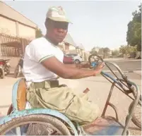  ?? ?? Bichi in his NYSC uniform