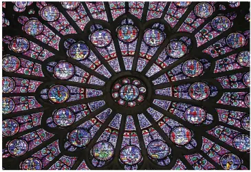  ??  ?? Gothic splendour: The interior of the cathedral, left, and one of the majestic rose windows, now believed to be destroyed