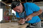  ?? ARIELLE KAUAEROA MONK ?? James York hard at work in the Oraka Aparima Runaka carving shed.