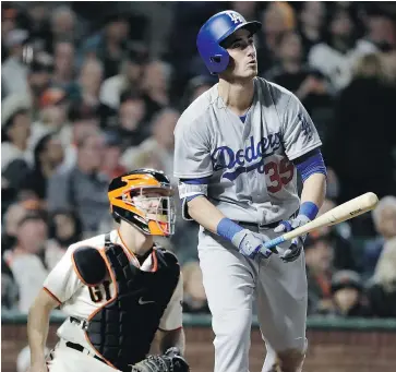  ?? AP PHOTO/MARCIO JOSE SANCHEZ ?? The Dodgers’ Cody Bellinger hits a two-run homer against the Giants on Sept. 13. There were 5,663 MLB home runs hit through Sunday.