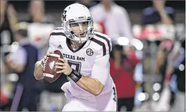  ?? STACY REVERE / GETTY IMAGES ?? Georgetown High product Jake Hubenak, after coming off the bench in Saturday’s loss to Ole Miss, appears to be in the mix for the Texas A&M quarterbac­k job as coach Kevin Sumlin seeks solutions for the offense.