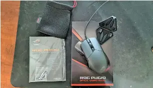  ??  ?? Asus goes all out with the packaging for the ROG Pugio