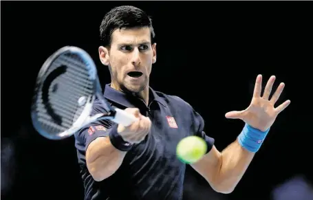  ?? Zatím postupuje Turnajem mistrů Novak Djokovič, v závěrečném duelu ve skupině porazil náhradníka Davida Goffina z Belgie 6:1, 6:2. FOTO ČTK/ AP ?? Bez porážky