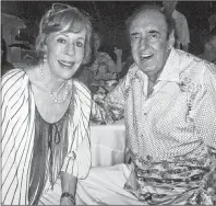  ?? AP PHOTO ?? In this June 12, 2015 file photo, Jim Nabors and his friend and longtime collaborat­or in comedy Carol Burnett celebrate Nabors’ 85th birthday at his home in Honolulu.