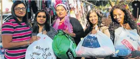  ?? Picture: Supplied ?? Cheryl Naidoo with Farhana Sheik, Priya Pillay, Niru Handle and Zandy Sutton, members of the Ultimate Gift group, a SA-based Facebook gift-giving group.