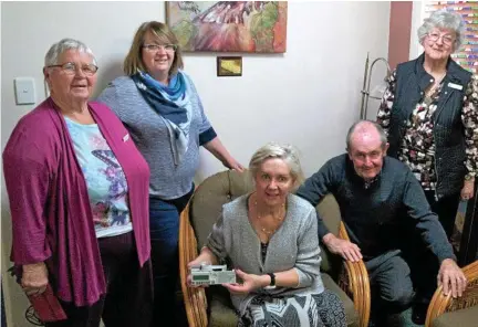  ??  ?? HELPING HANDS: Discussing hospice equipment needs are (from left) Joy Mort, Allison Leech, Marlene Jackson, Graham Barron and Betty McCredden.