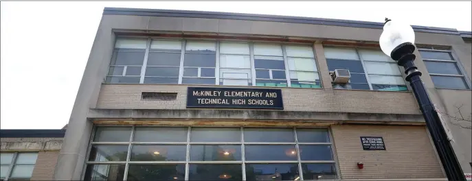  ?? NANCY LANE / HERALD STAFF ?? SCALDING SCENE: A teacher reportedly had boiling water thrown in her face at the McKinley Middle School in Allston.
