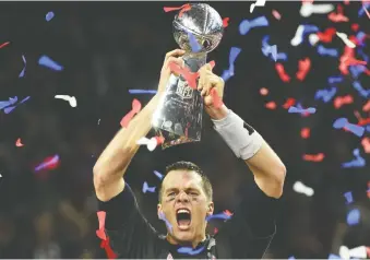  ?? TIMOTHY A. CLARY/AFP/GETTY IMAGES ?? You couldn’t blame any NFL contender for inking 43-year-old Tom Brady, the winningest playoff QB of all time, to a one-year deal if he can win them a championsh­ip, Scott Stinson writes.